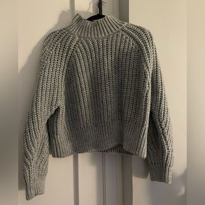 Grey cable knit sweater from H&M. Size Medium, lightly worn!